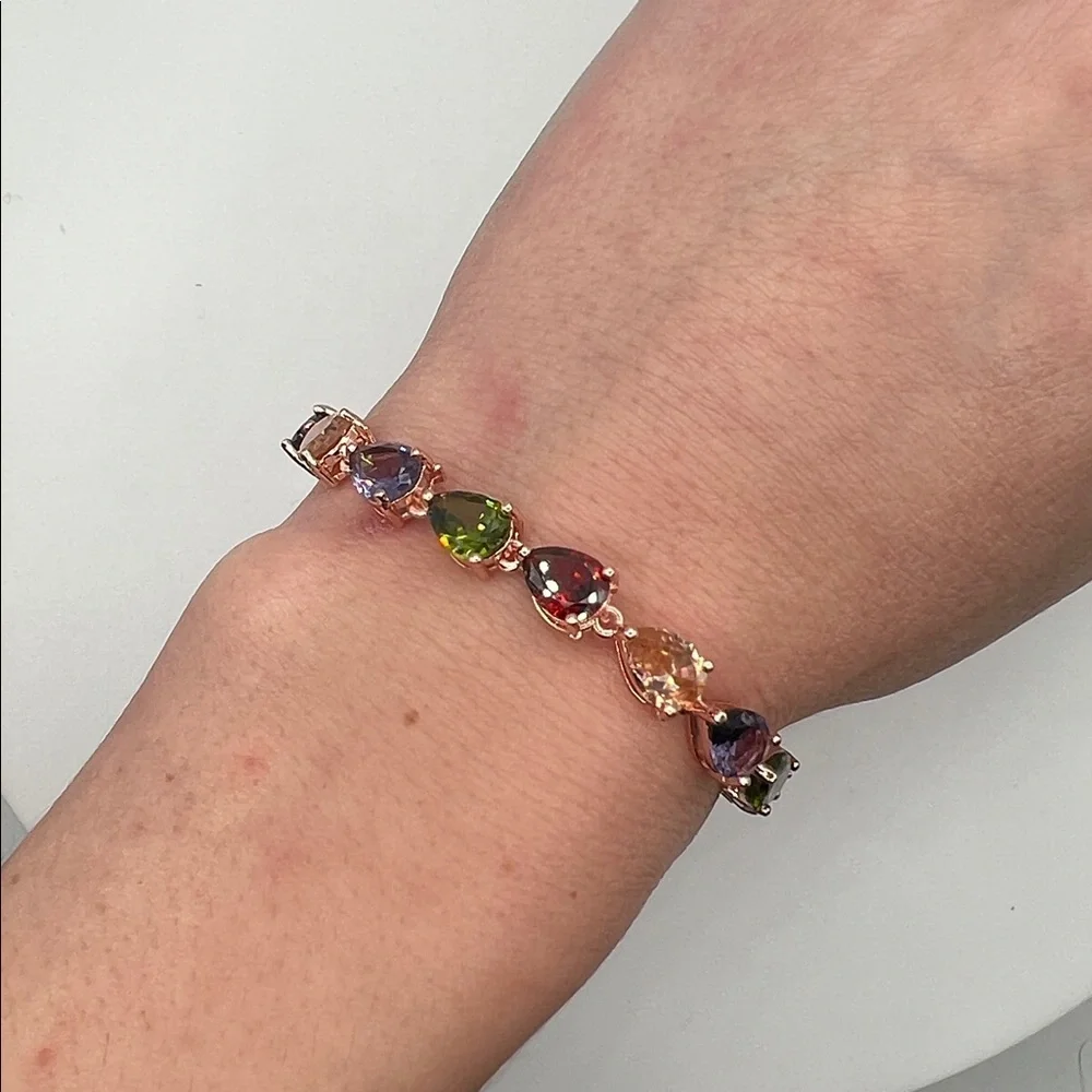 186. Rose Gold Plated Multi Jewel Tone Bracelet 7 1/4”